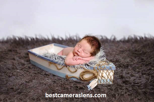newborn boy photography with boat